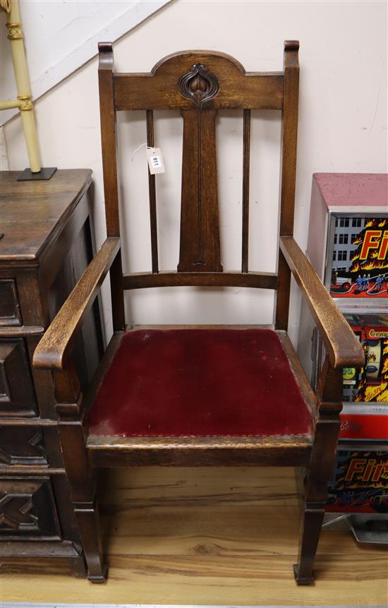 A pair of oak Art Nouveau elbow chairs